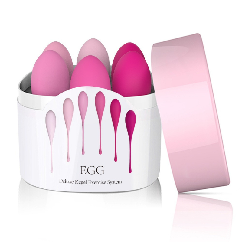 Coffret Ă©lĂ©gant contenant les 6 boules de Kegel Alpha en dĂ©gradĂ© de rose, parfait pour lâentraĂźnement progressif.