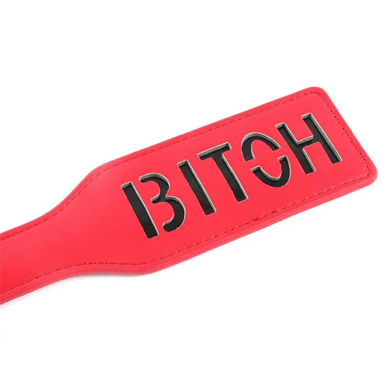 Tapette à fessée avec lettre