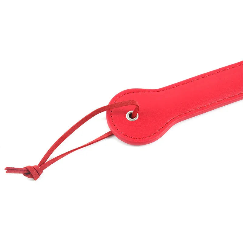 Tapette à fessée avec lettre