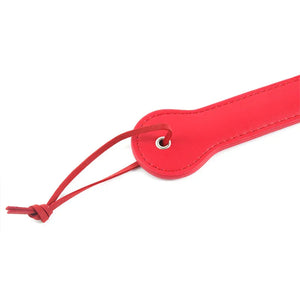 Tapette à fessée avec lettre