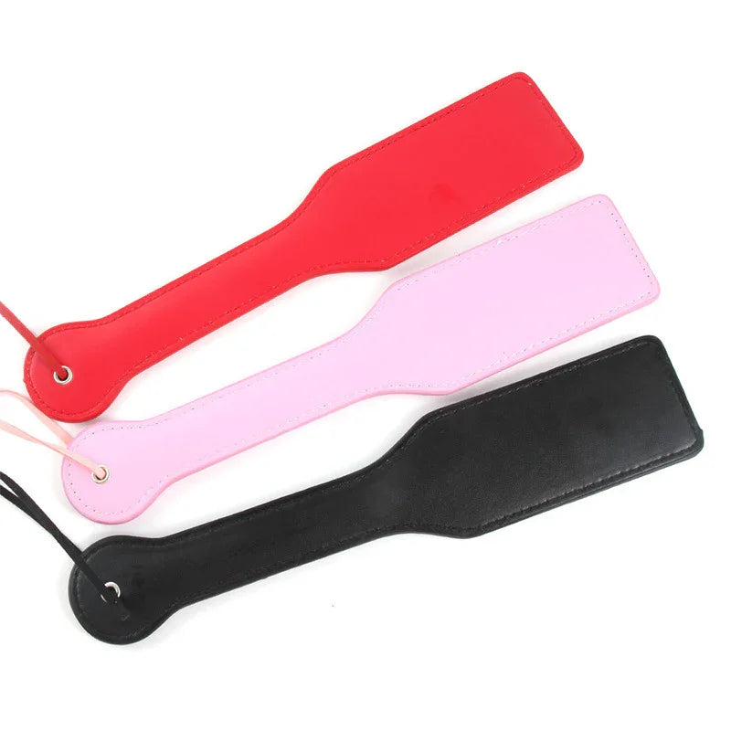 Tapette à fessée avec lettre