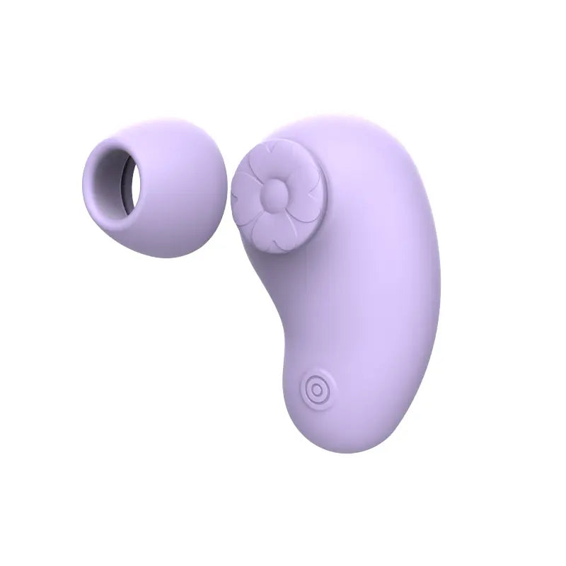 Stimulateur clitoridien Floa lavande avec double embout interchangeable pour des sensations variées.
