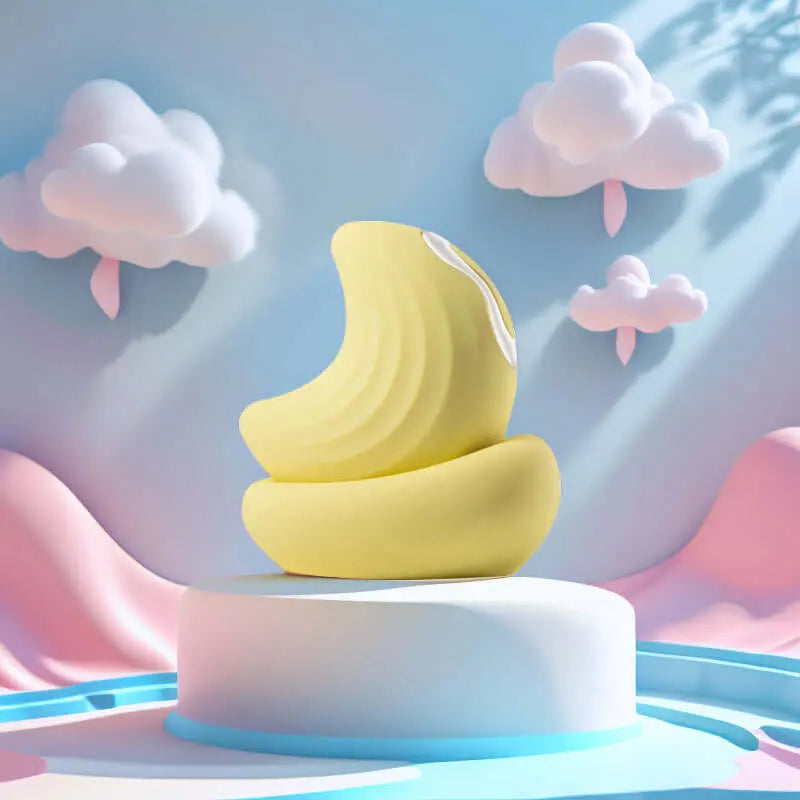 Stimulateur Luna jaune mis en valeur dans un décor pastel artistique happygalaxy