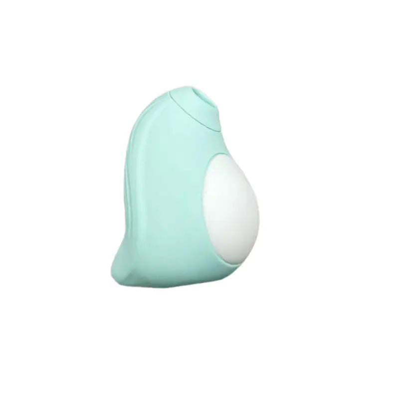 Stimulateur Penguin vert menthe en silicone doux, parfait pour le voyage