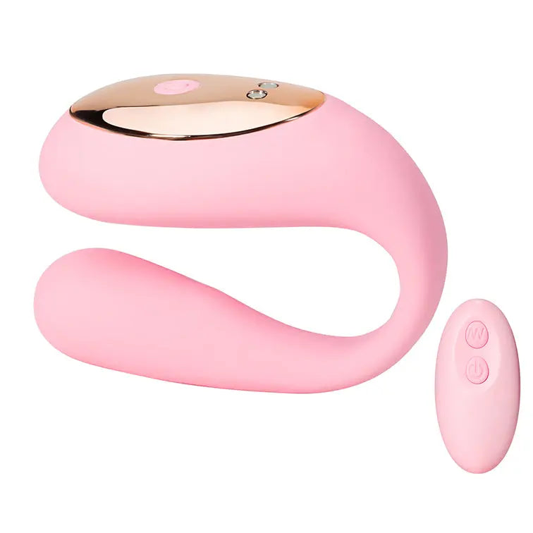 Vibromasseur Love Magic rose avec télécommande, idéal pour les jeux à deux.