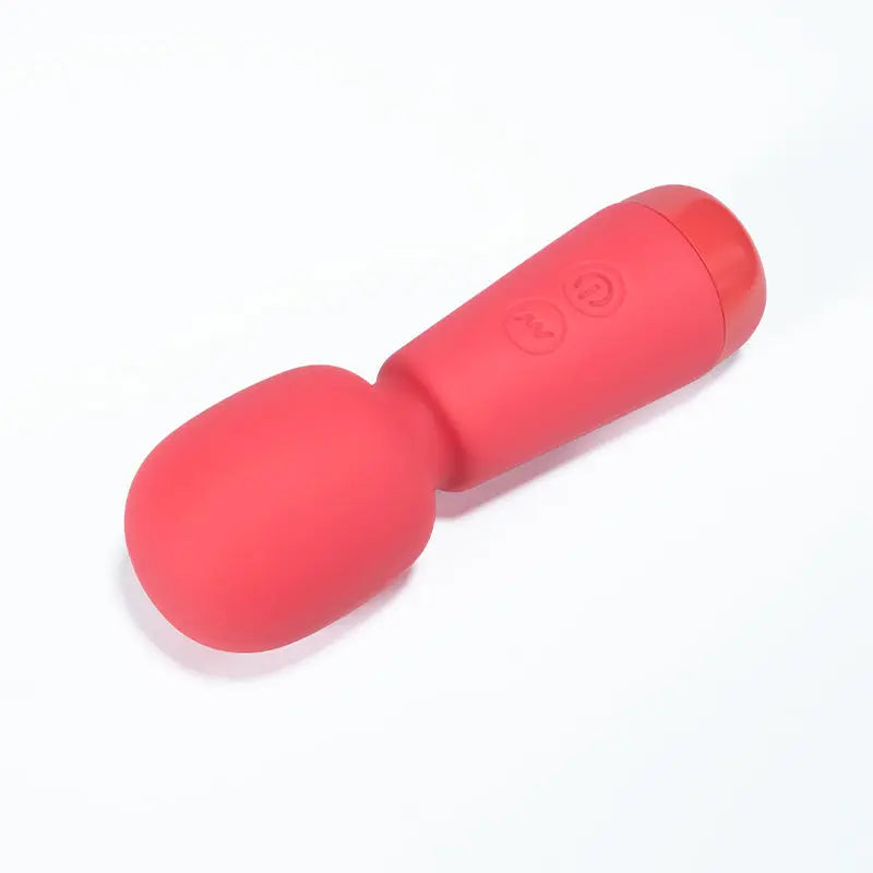 Vibromasseur rose Ivy allongé, vue détaillée sur les boutons de commande